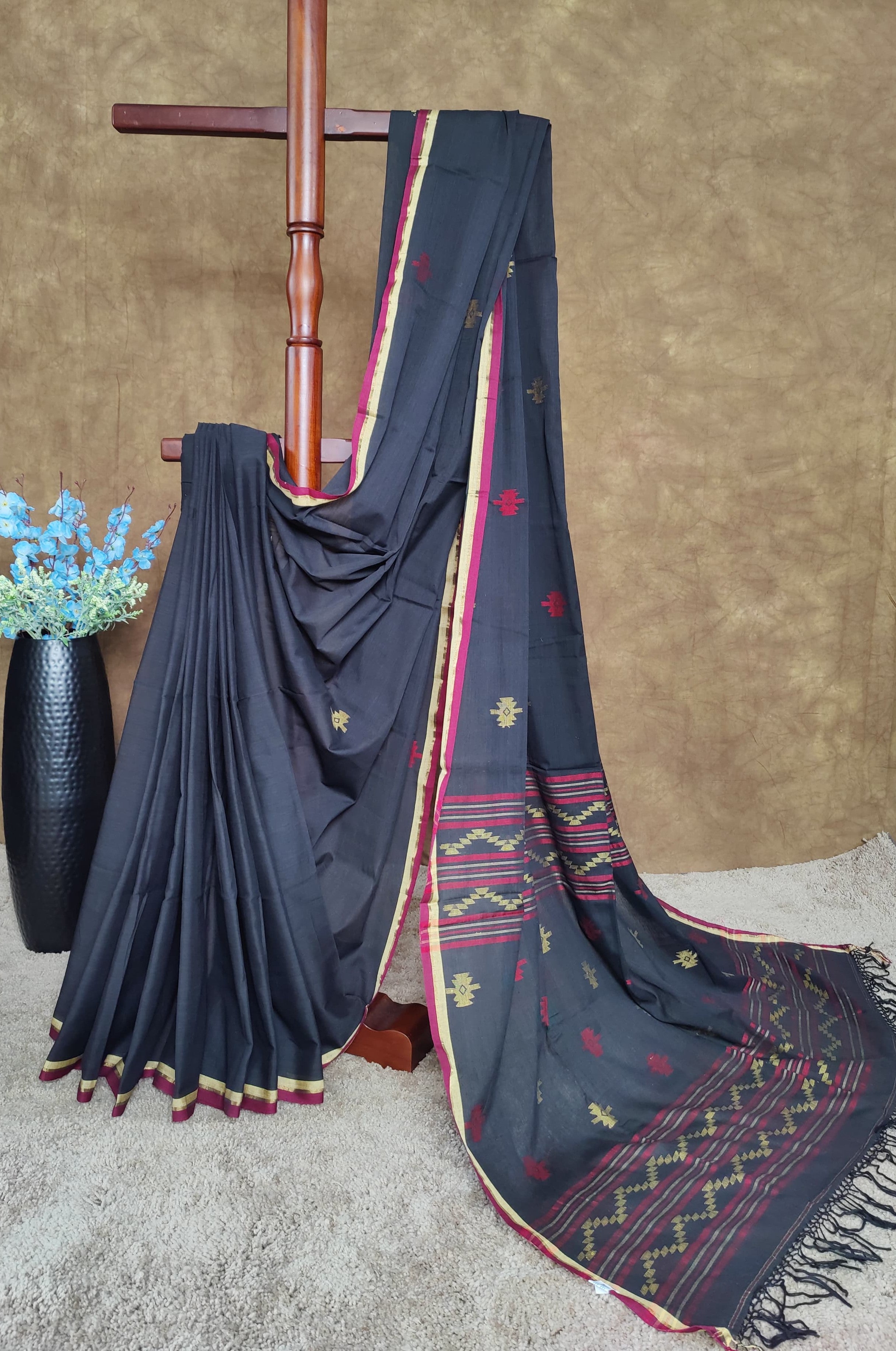 Black cotton Jamdani saree with red and yellow motifs